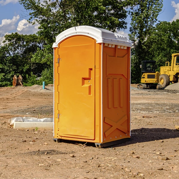 how often are the portable toilets cleaned and serviced during a rental period in Van Meter